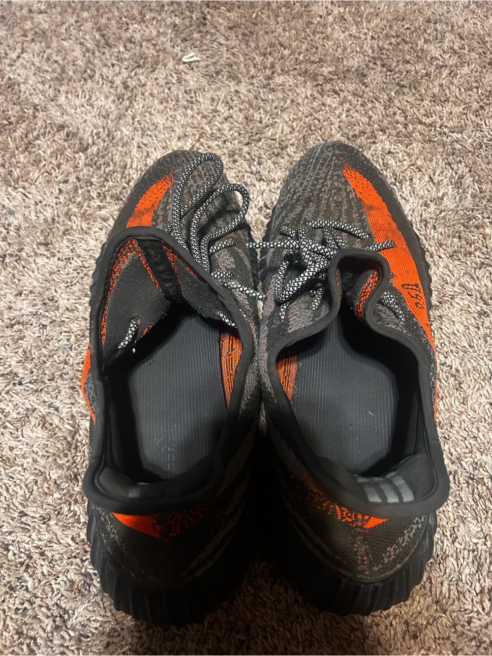 Yeezy Black and Orange Knit Athletic Sneakers